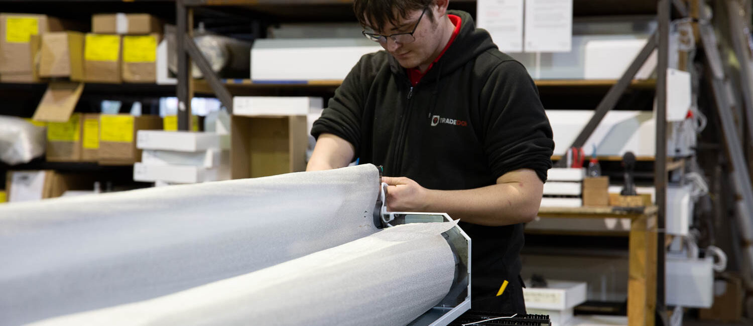 A garage door being created by a tradedor member